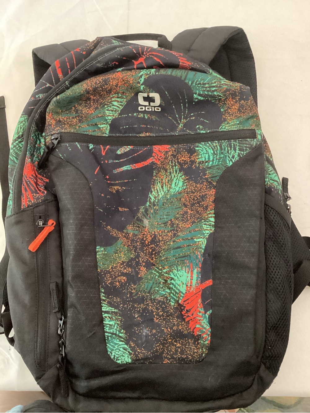 OGIO Black Backpack with Green and Red Leaf Pattern